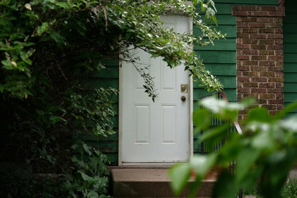 Residential front door illustrating the installation and exterior exposure considerations for a smart deadbolt